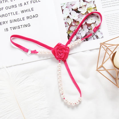 Open Crotch Women's underwear thong with beads and flower in the shape of a harness