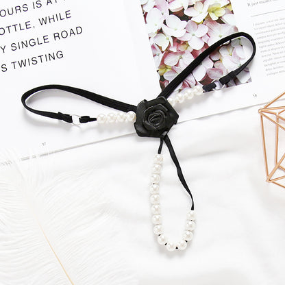 Open Crotch Women's underwear thong with beads and flower in the shape of a harness